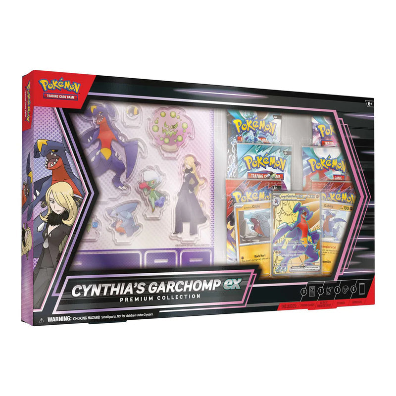 Pokémon TCG: Cynthia’s Garchomp ex Premium Collection med artwork af Cynthia og Garchomp, indeholdende foil-kort, boosterpakker, klistermærker og display-standees i en luksuriøs gaveæske.